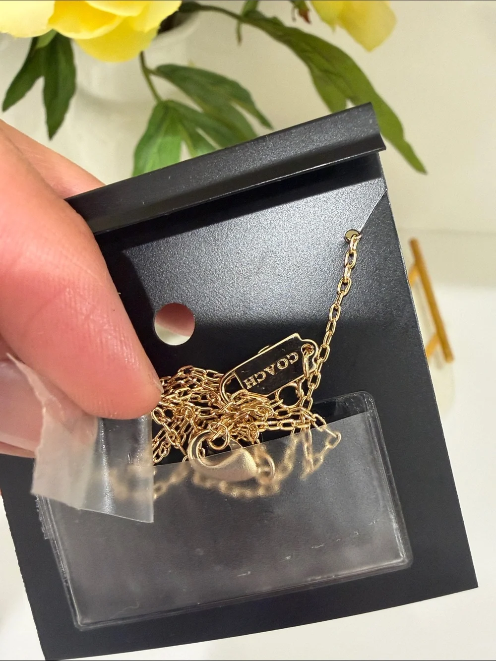 Coach Gold-Tone Necklace with White Enamel Interlocking Circles